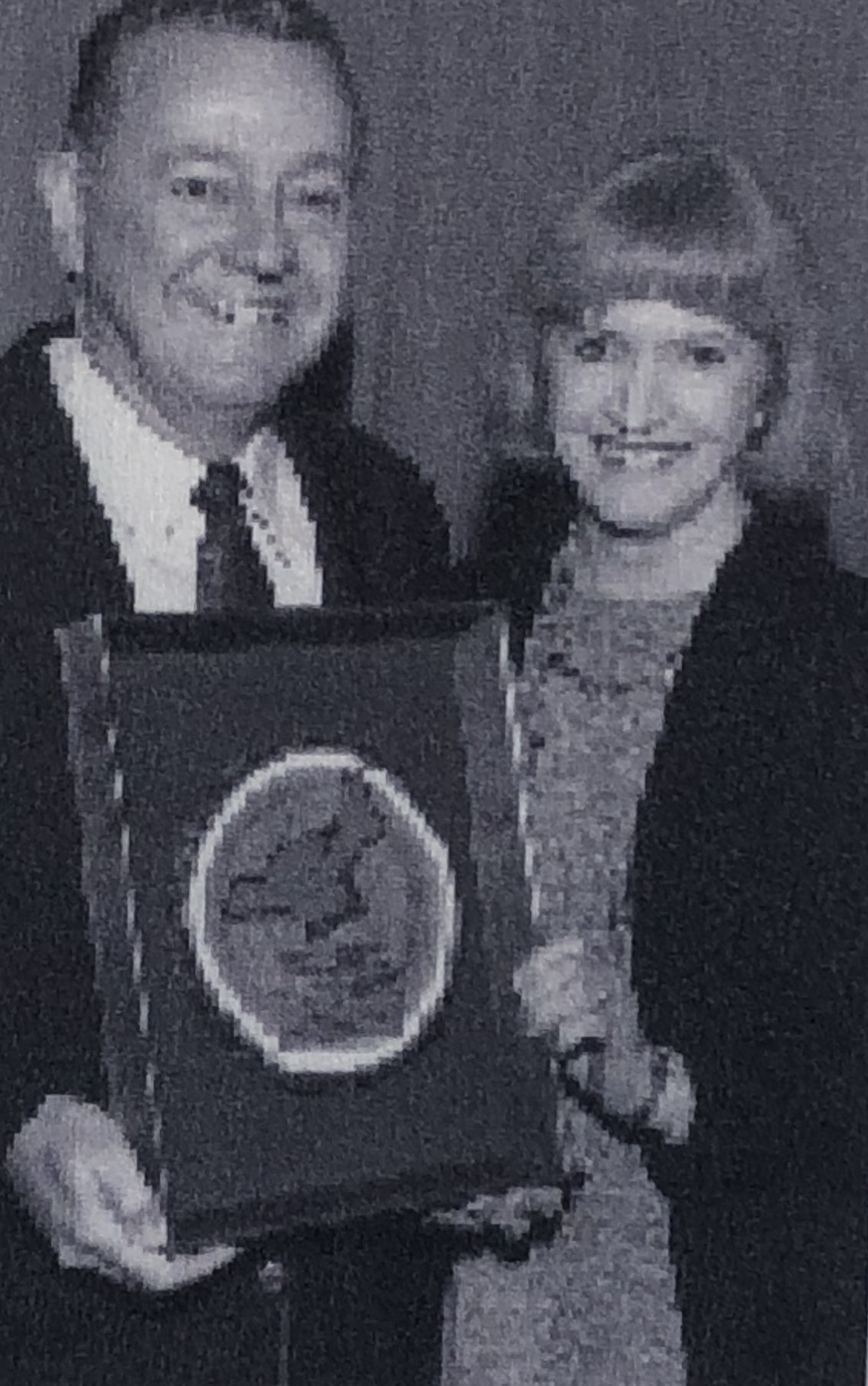 Pete & Denise receiving lumber man of year award 1994 NRLA